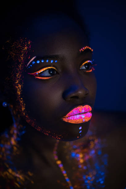 istock attractive african lady with fluorescnet luminescence prints on skin 1226192830