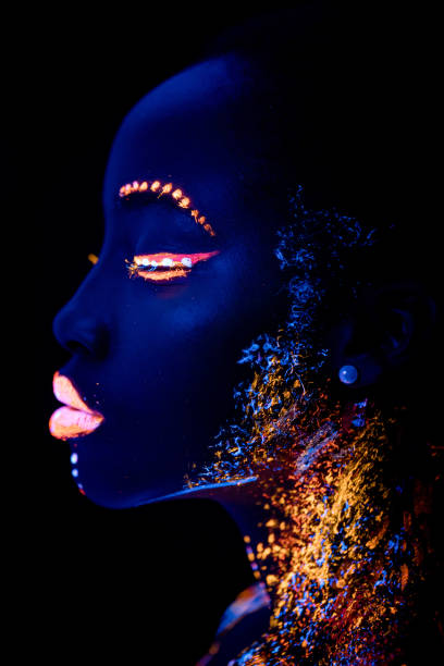 istock african model in neon light, girl with fluorescent makeup 1226193011