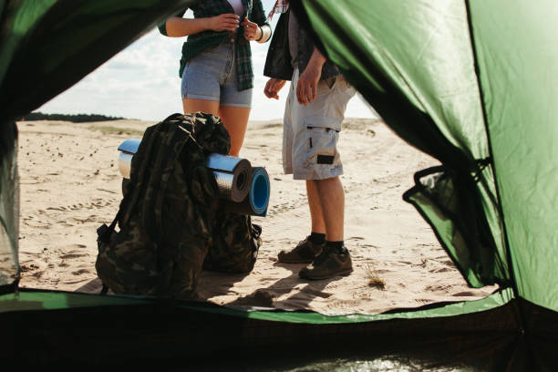 istock Group of tourists camping in desert 1226194391