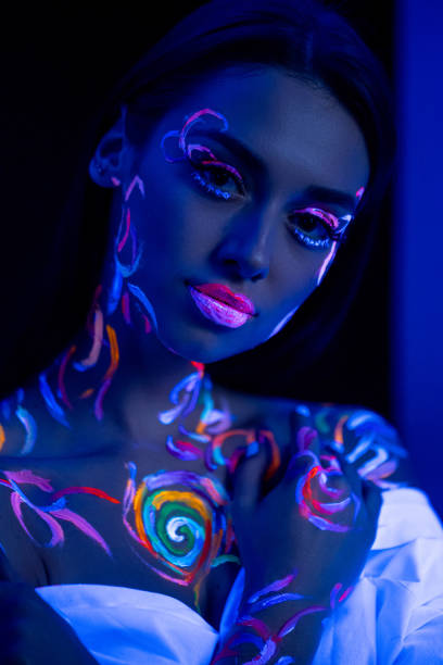 istock beautiful caucasian model with fluorescent make-up 1226198357