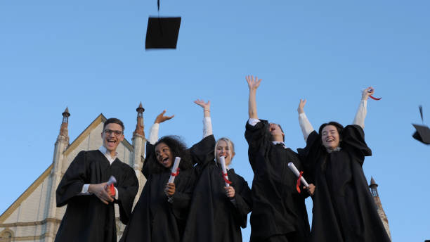 istock Graduation Caps Thrown in the Air 1226201387