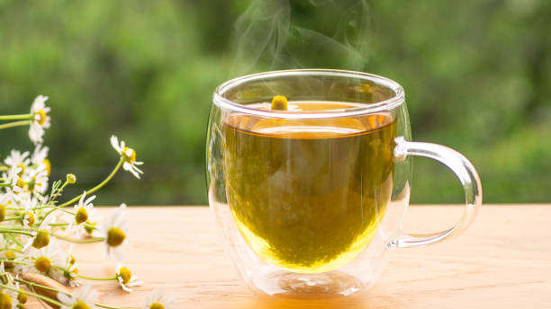 istock Chamomile flowers and chamomile tea. Herbal chamomile tea. Close-up. 1226204637