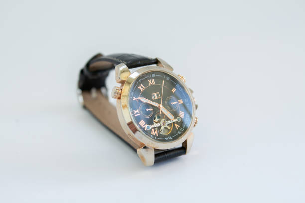 istock men's gold watch with a leather strap 1226206922