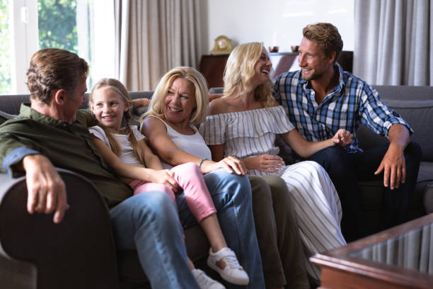 istock Multi-generation Caucasian family sitting on a couch together 1226206962