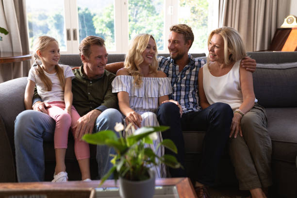 istock Multi-generation Caucasian family sitting on a couch together 1226207044