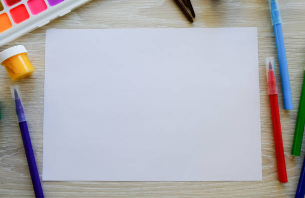 istock Drawing album, colored pencils and felt-tip pens on the table. Creativity concept 1226208158