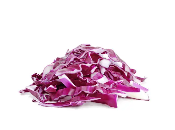 Photo of Sliced of red cabbage on white