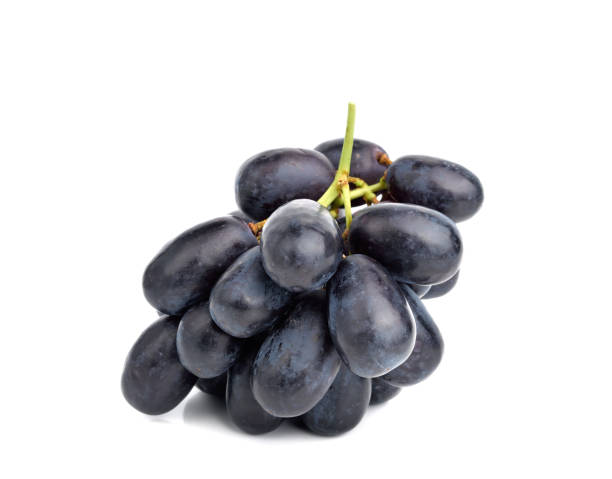 istock Close up of black grapes on white 1226208747