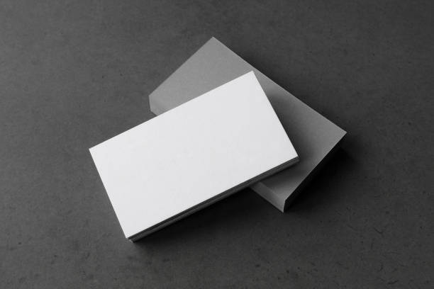 istock Business card on black background. 1226211109