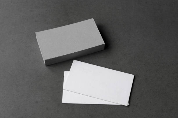 istock Business card on black background. 1226211214
