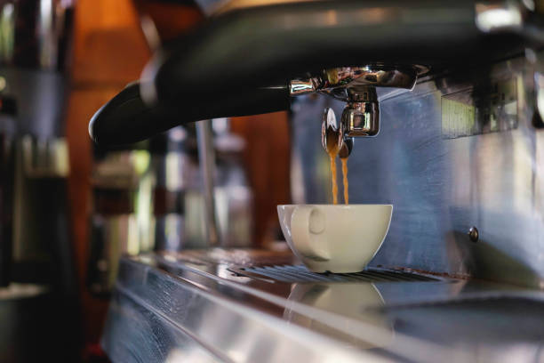 istock Barista prepares to make coffee with a coffee machine. 1226212154