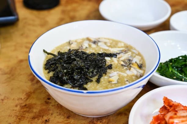 istock Samgyetang is chicken ginseng soup from Korean. Inside the chicken stuffed with various kinds of herbs. Served in a stone-made soup pot Hot eating is believed to promote health and nourishment. 1226216412