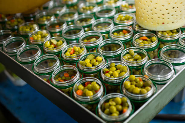 istock Glass cans filled with marinated olives 1226221657