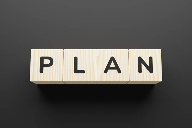istock Plan - word on wooden cubes, top view. 1226221917