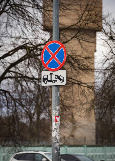 istock traffic sign warning no parking and car evacuation 1226226914