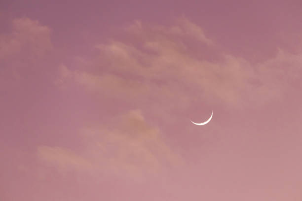 istock Crescent moon on sweet sky. Look like a smile on a good day. 1226230271