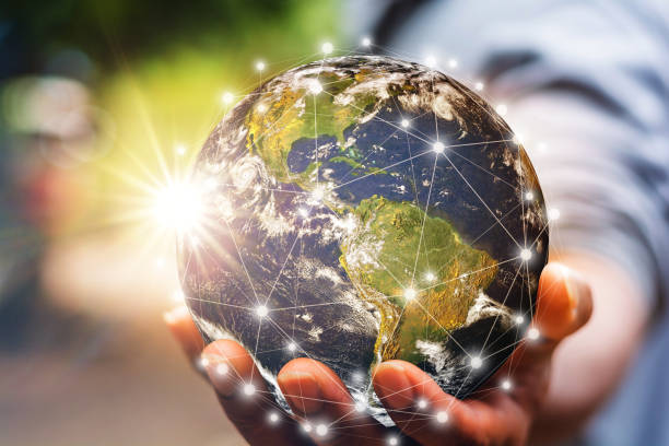istock Hand holding flying earth network global connection concept, Energy and ecology concept, Elements of this image furnished by NASA 1226234055
