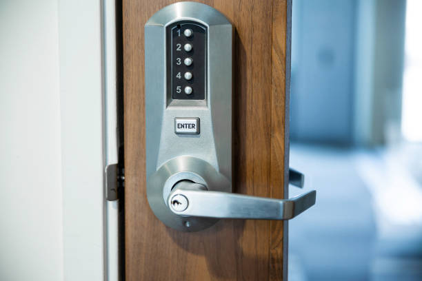 istock Digital smart door lock security system with a password, close up on numbers on the screen. 1226234120