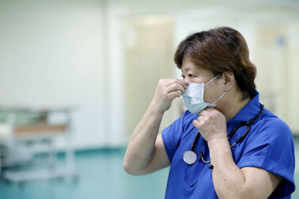 istock Covid-19: Wearing Surgical Mask in Hospital 1226234152