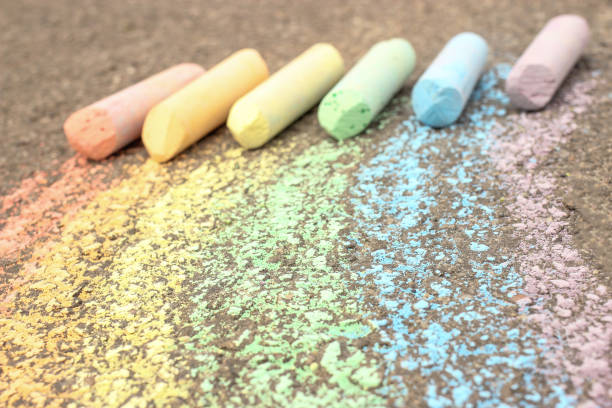 istock The rainbow is drawn on the asphalt, sidewalk with colored crayons, chalks 1226234615