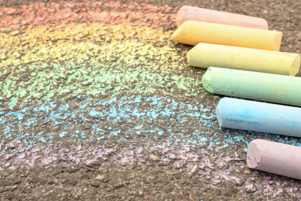 istock The rainbow is drawn on the asphalt, sidewalk with colored crayons, chalks 1226234618