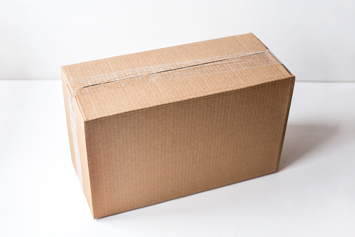 Cardboard box on white background. Delivery concept.