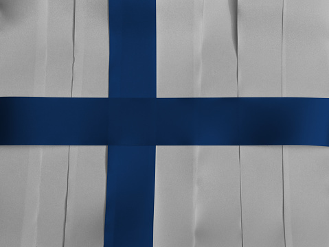 Colorful ribbon as Finland national flag, Sea blue Nordic cross on a white field.