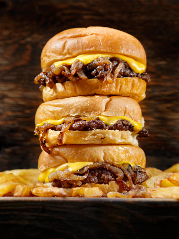 The Famous Fried Onion Smash Burger with Cheese and Fries