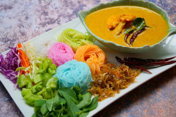 istock Thai rice noodles in grab curry sauce with vegetable 1226238837