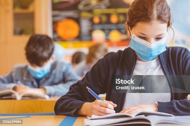 High School Girl Student At School Wearing N95 Face Masks Stock Photo - Download Image Now
