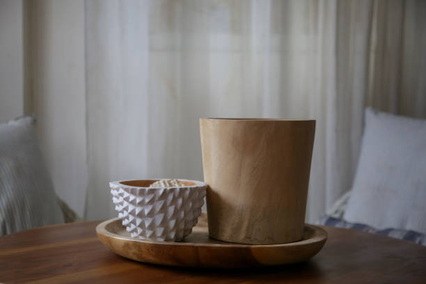 istock Decorative wooden bowls on the table in modern interior. 1226240260