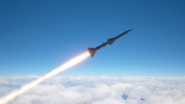 istock Cruise missile fly above the clouds 1226240409