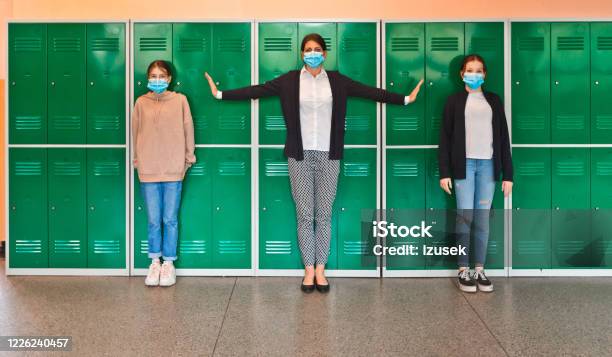 High School Students And Teacher Wearing N95 Face Masks At School Stock Photo - Download Image Now