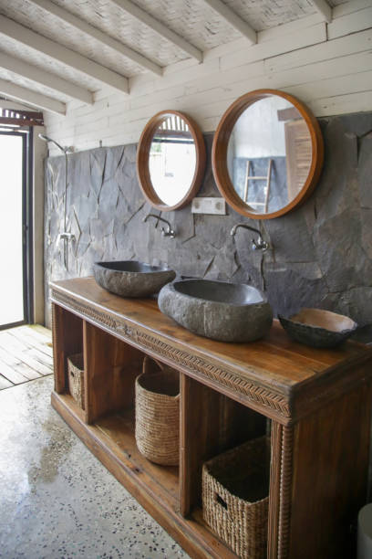 istock Simple contemporary bathroom in boho style. Small budget-friendly powder room in beachy boho chic vibes. 1226240487