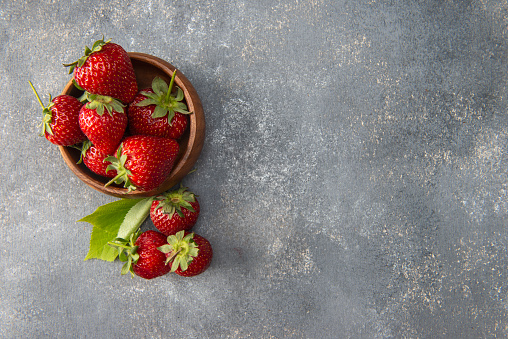 Fresh strawberries in a bowl.