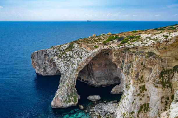 istock Blue Grotto with a tiny island in the Mediterranean Sea, Malta 1226242352