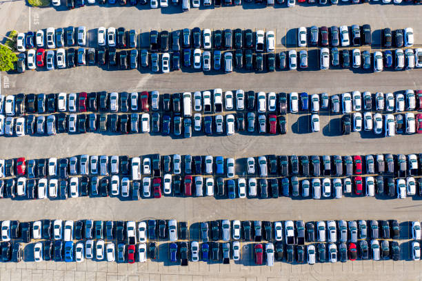 Aerial view of parked cars Aerial view of various parked cars car rental covid stock pictures, royalty-free photos & images
