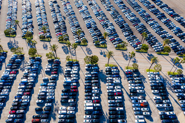 Aerial view of parked cars Aerial view of various parked cars car rental covid stock pictures, royalty-free photos & images