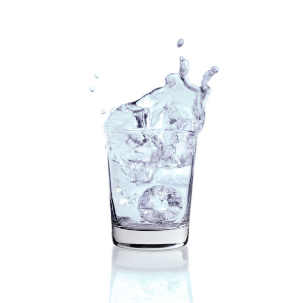 istock Water splashing from glass isolated on white background. with clipping paths. 1226245935