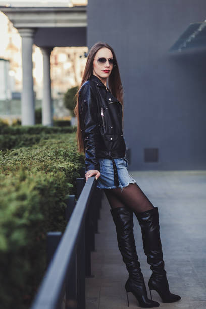 istock brunette Vogue model in a leather jacket 1226250626