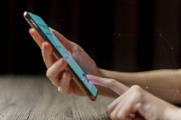 istock Woman hand holding smartphone. Payment and 3D Connection 1226251933