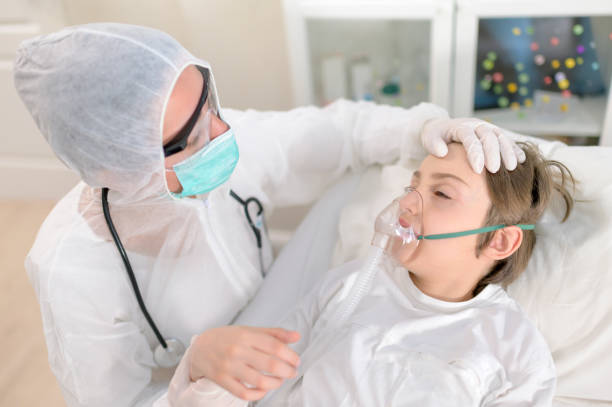 istock Doctor Intubating a Kid Having a Respiratory Desease 1226252712
