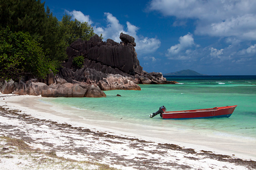 Seychelles - Curieuse Island - The boat on Baie Laraie beach in Marine National park of Curieuse