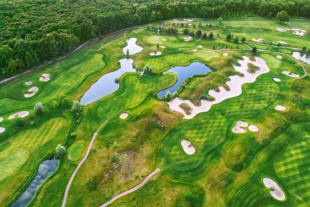 istock Aerial view to golf course, sport and recreation background 1226254342