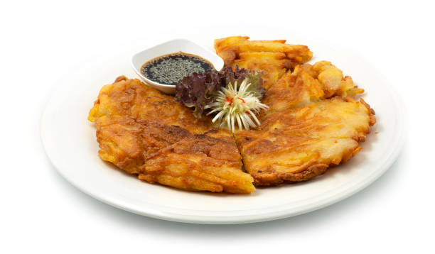 Korean Potato Pancake Vegetarian (Yachaejeon) Style served dipping soy sauces sweet and Sour Tasty Sprinkle with Sesame stock photo