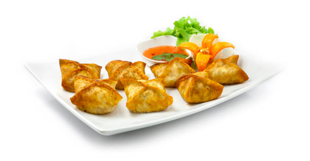 Deep Fried Wonton Stuffed pork Served with Sweet Chili Sauce Appetizer Thai and Chinese Cooked Style stock photo