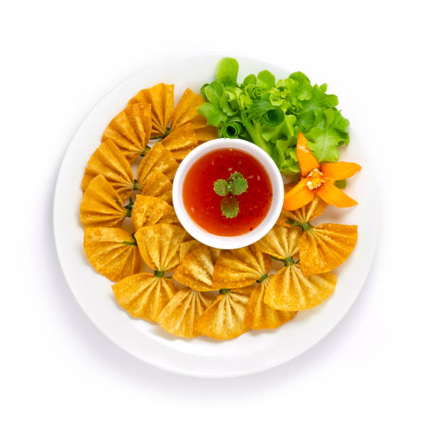 istock Deep Fried Bow Wonton Served with Sweet Chili Sauce Appetizer Thai and Chinese Cooked Style 1226256802