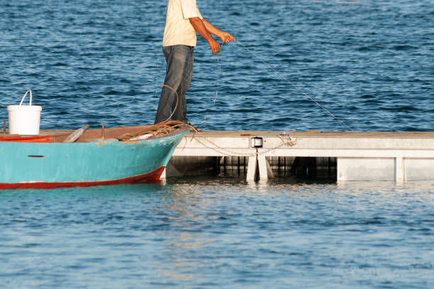 istock Fisherman is sailing and fishing 1226256894
