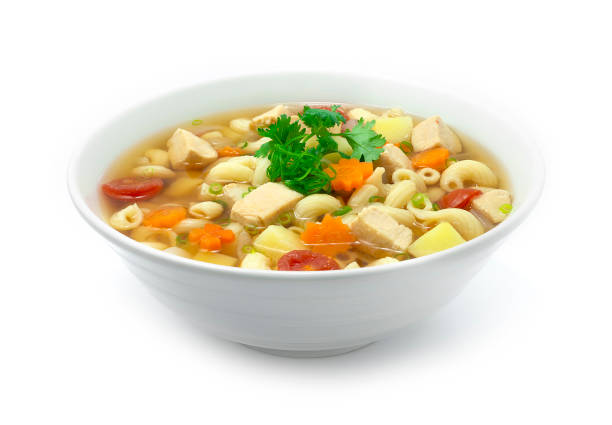 Macaroni Soup with Chicken,tomato,potato,carrots and onion Served as Breakfast Macaroni Soup with Chicken,tomato,potato,carrots and onion Served as Breakfast, side dish or Maincorse goodtasty delicious decorate Coriander sideview soup photos stock pictures, royalty-free photos & images