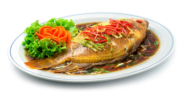 istock Steamed Fish with Soy Sauce, Ginger, Spring onion and Chili (Red Tilapia Fish) Authentic Asian 1226259059